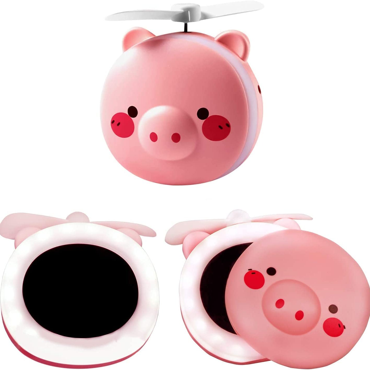 Pink pig-shaped compact mirror with a small fan on a white background