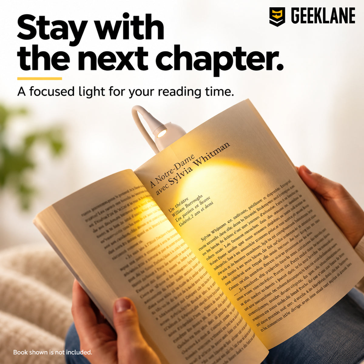 Immerse — hands reading with clip light.