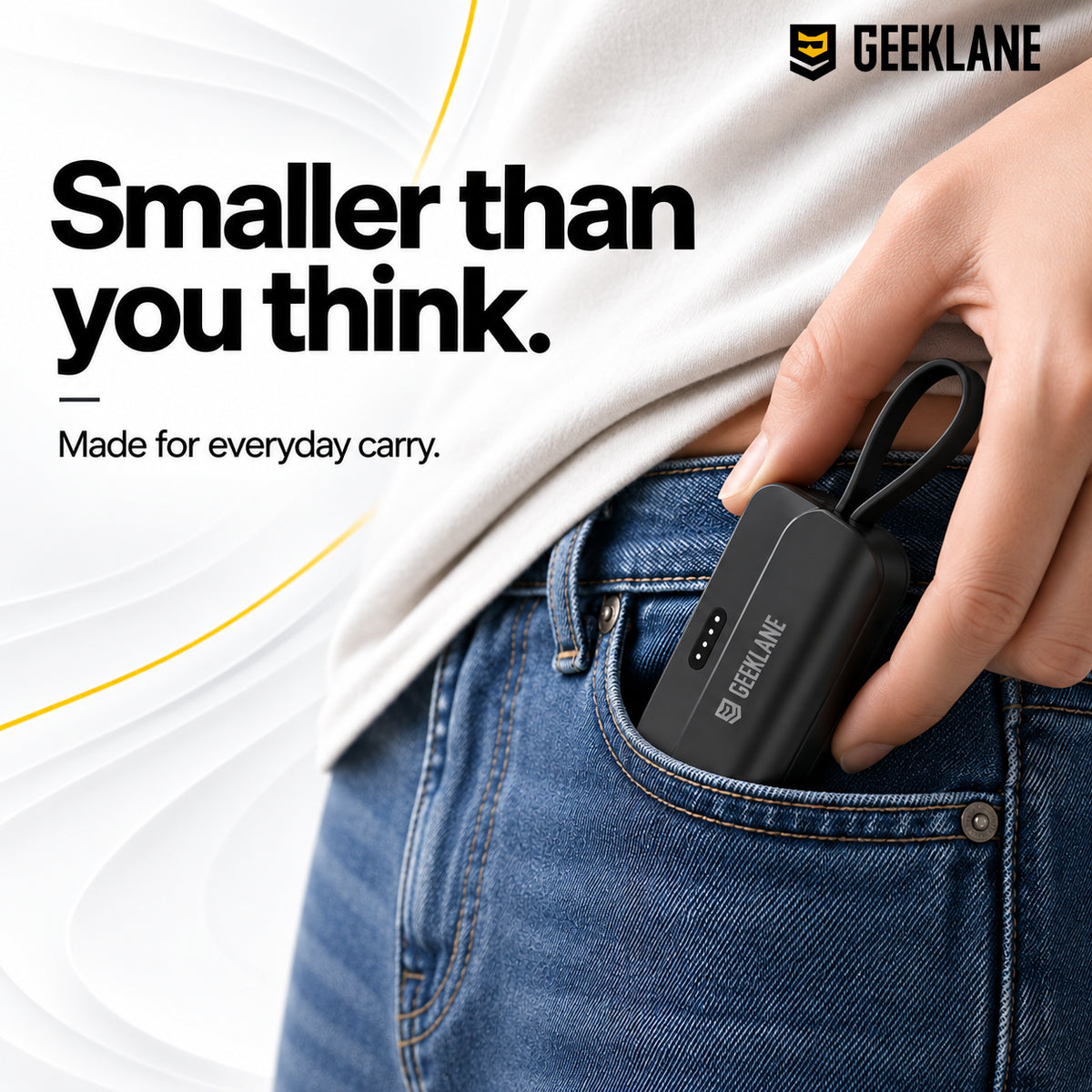 Pocky compact power bank held beside a denim pocket to demonstrate its portable size.